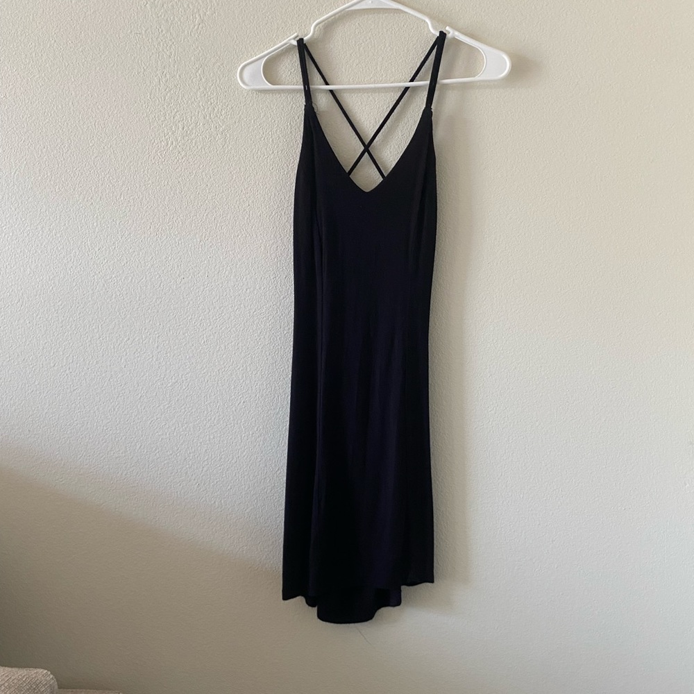 women’s black mini dress with open crossback